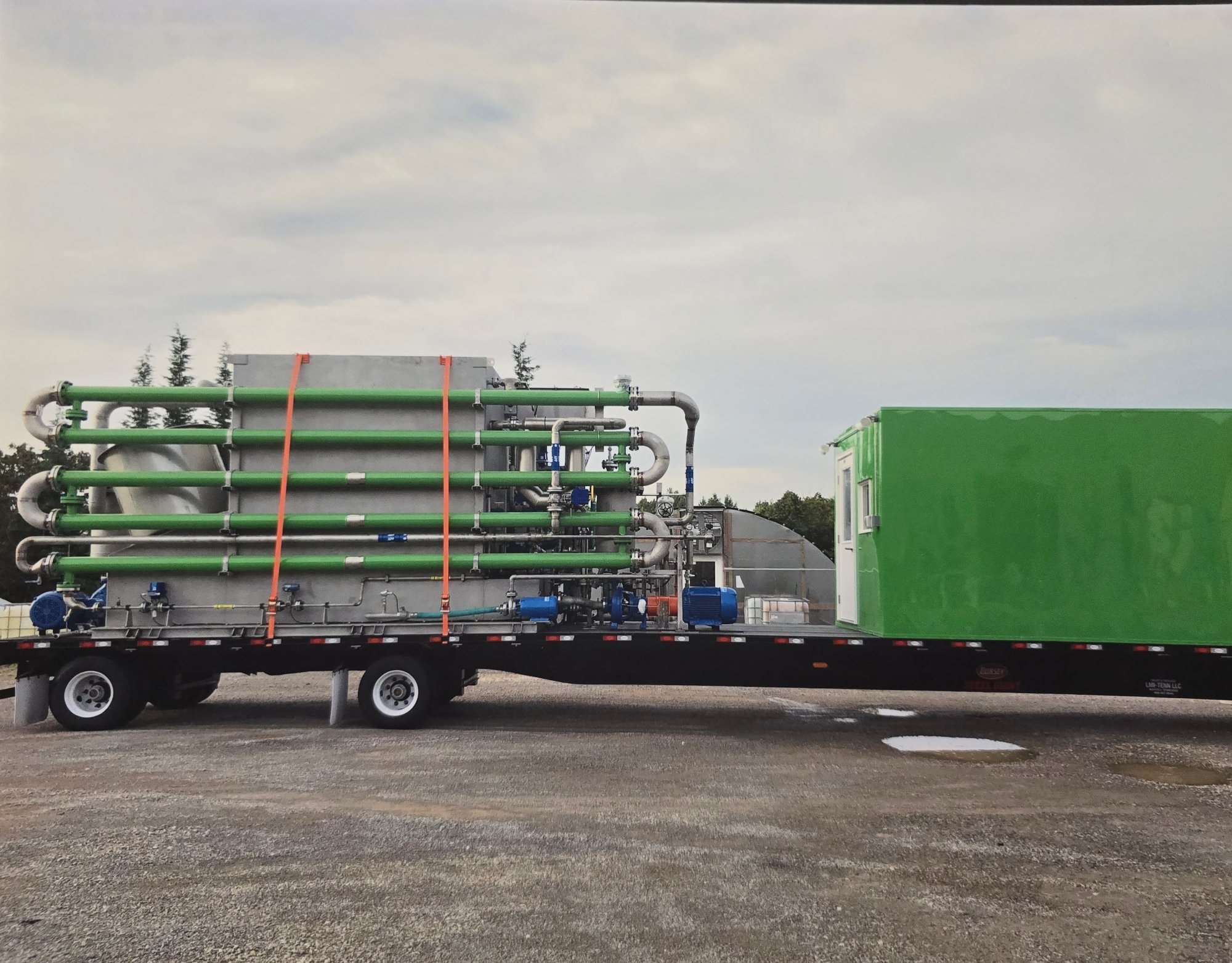 Skid mounted system on trailer